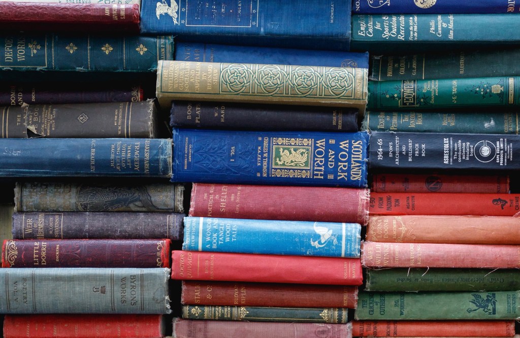 image: stacks of antique books